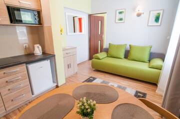 Фото номера Апартаменты с 1 спальней Апартаменты Apartamenty Słodki Zakątek г. Мушина 10