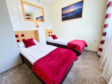 Фото номера Апартаменты с 2 спальнями Апартаменты Apartamenty Słodki Zakątek г. Мушина 9