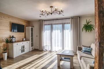 Фото номера Шале с 3 спальнями Апартаменты Apartamenty Słodki Zakątek г. Мушина 6